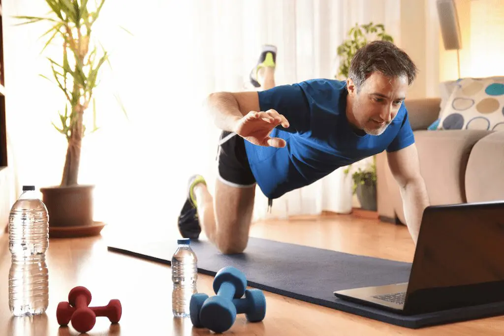 A man is doing exercises on the floor