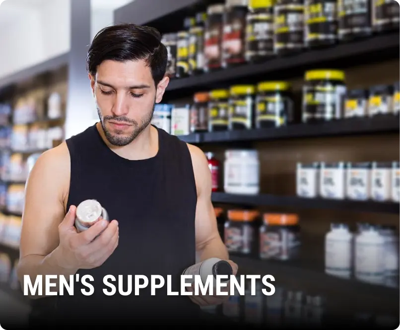 A man is holding a jar of supplements in his hand.